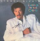 Man in white suit on vintage album cover