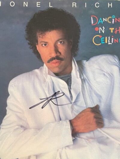 Man in white suit on vintage album cover