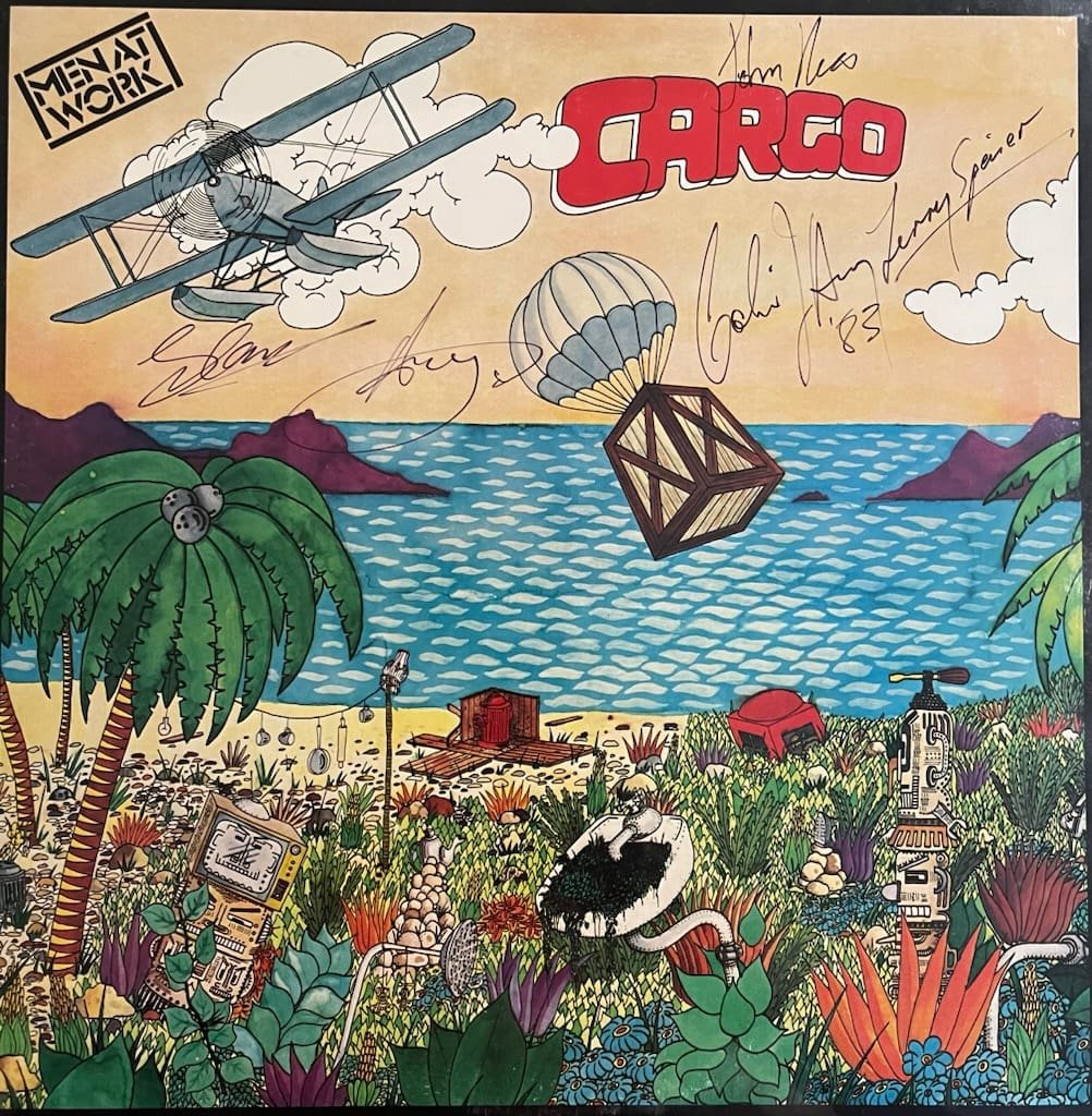 Biplane dropping cargo crate over tropical island