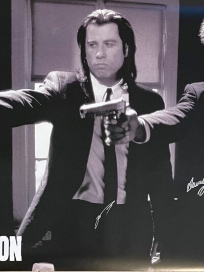 Two men aiming guns