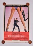 James Bond poster with crossbow and legs.