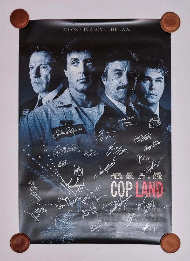 Movie poster for "Cop Land" with signatures.