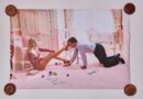 Man and woman in playful indoor setting.