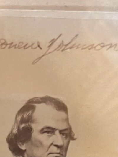 Vintage portrait with handwritten signature above.