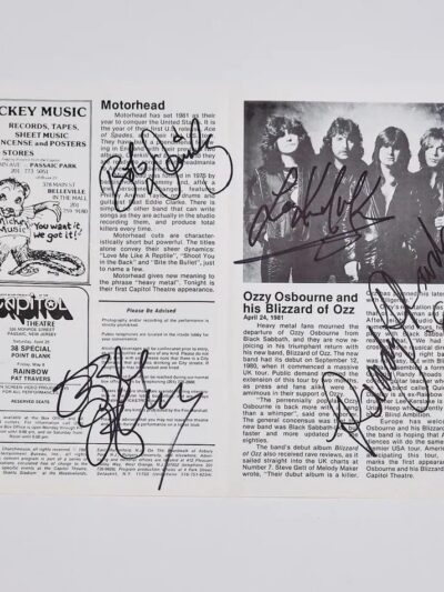 Signed music magazine page with band photo.