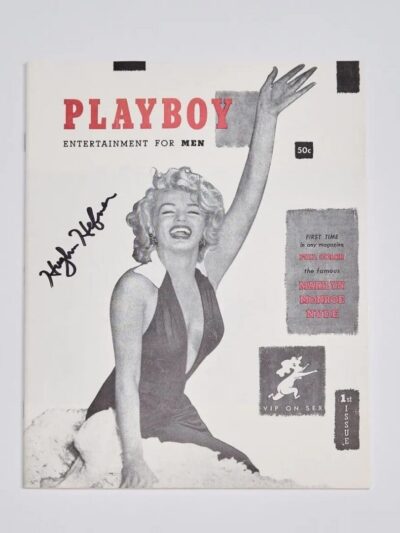 Magazine cover with woman in swimsuit.