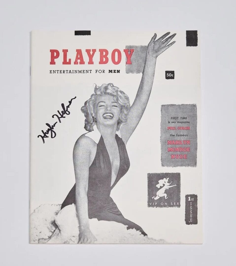 Magazine cover with woman in swimsuit.
