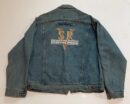 Denim jacket with Stevie Ray Vaughan logo.
