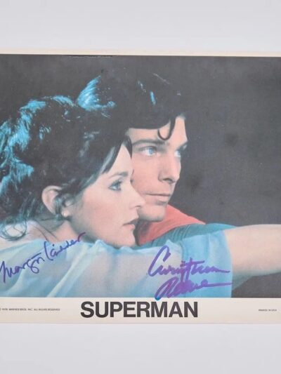 Superman and woman looking into distance.