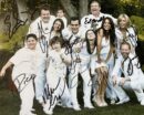 Group photo of people in white clothes.