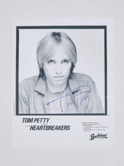 Black and white signed band photo.