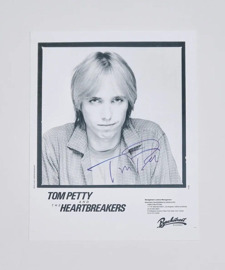 Black and white signed band photo.