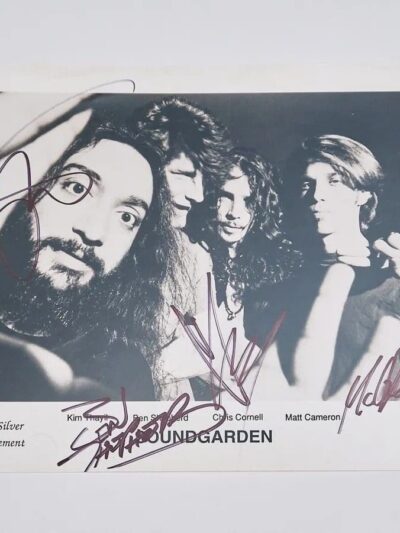 Black-and-white photo of a rock band.