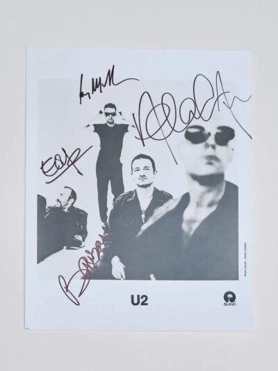 Signed band photo with four members