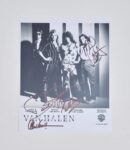 Black-and-white signed Van Halen band photo.