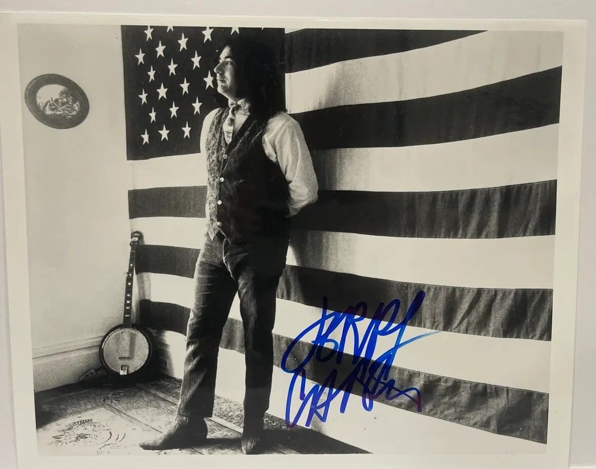 Man standing by American flag
