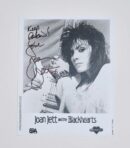Autographed Joan Jett photo with guitar.