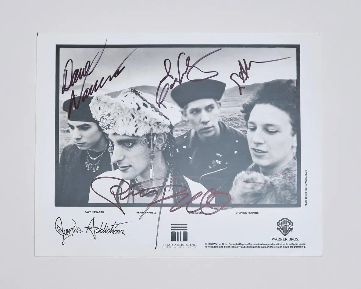 Black-and-white photo with multiple signatures.