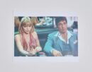 Man and woman sitting at a table.