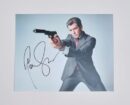 Man in suit aiming gun