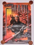 Darth Maul poster with autographs and lightsaber.