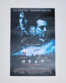 Movie poster with actor signatures.