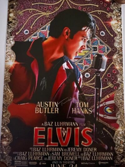 Elvis movie poster with Austin Butler singing.