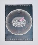 Album cover with circular design and signatures.