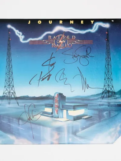 Album cover with signatures and radio towers.