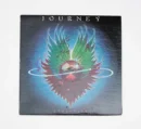 Journey Evolution album cover with signature.