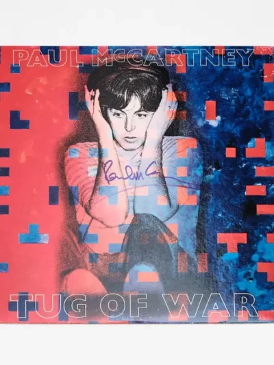 Tug of War album cover with signature.