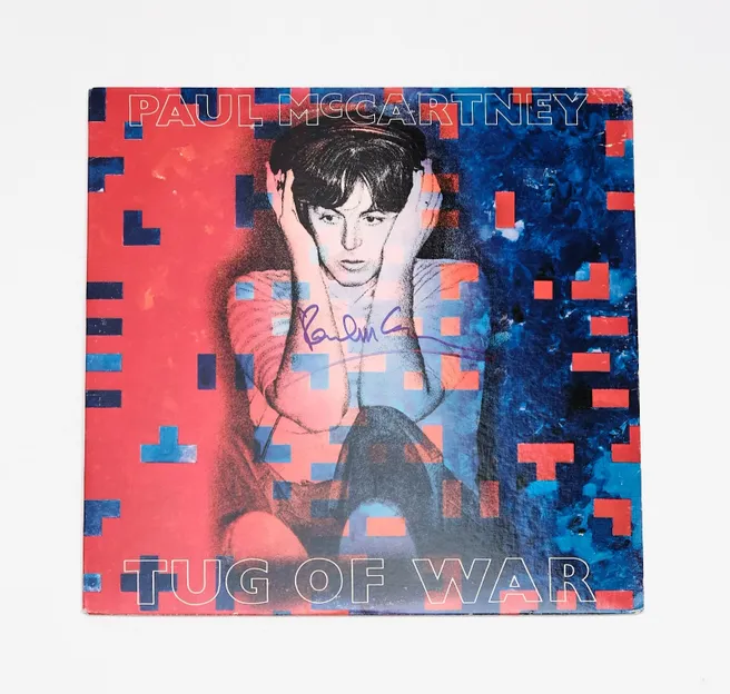Tug of War album cover with signature.