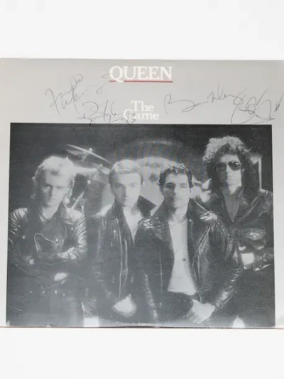 Queen "The Game" album cover with signatures.