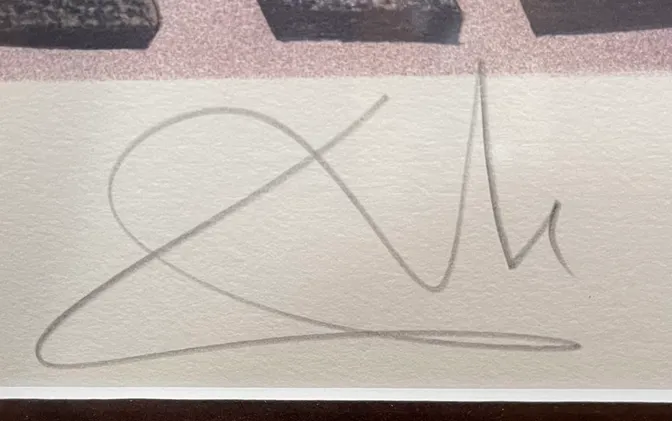 Signature in black ink on white paper.