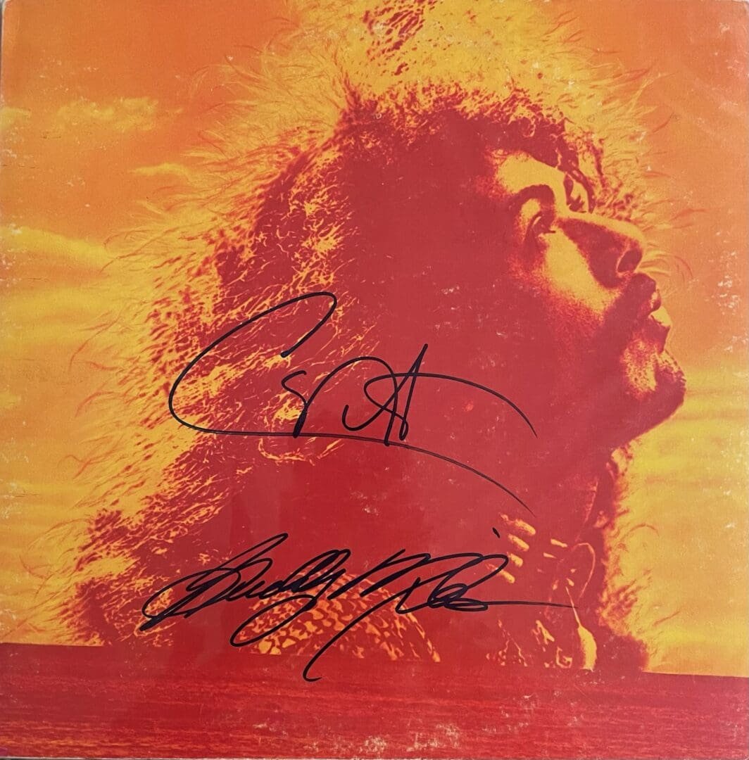 Autographed orange album cover with musician profile