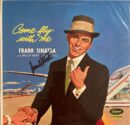 Retro album cover man in hat by airplane