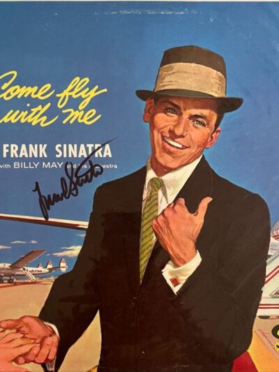Retro album cover man in hat by airplane