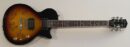 Sunburst electric guitar with autographs on body.