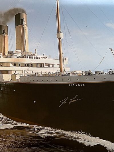 Titanic sailing with autographs on the photograph.