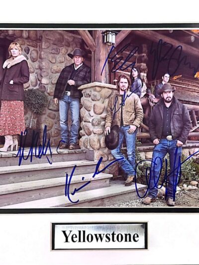 Cast of Yellowstone signed photo on porch.